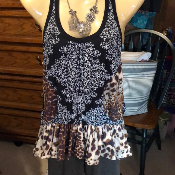 Seven Wonders Tops - 3/20. Trendy edgy top